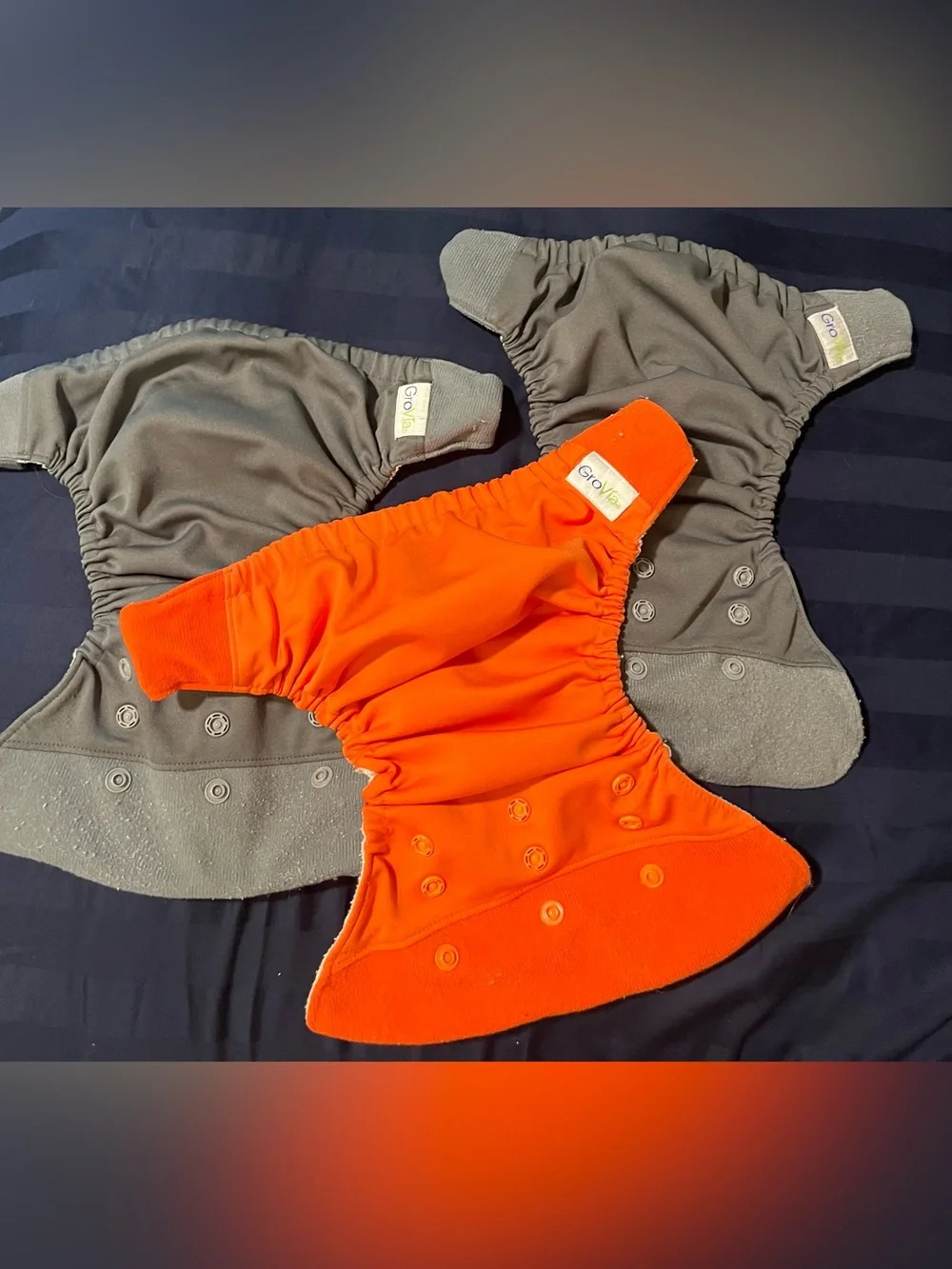 3 Reusable diaper covers & 4 inserts. Grovia.